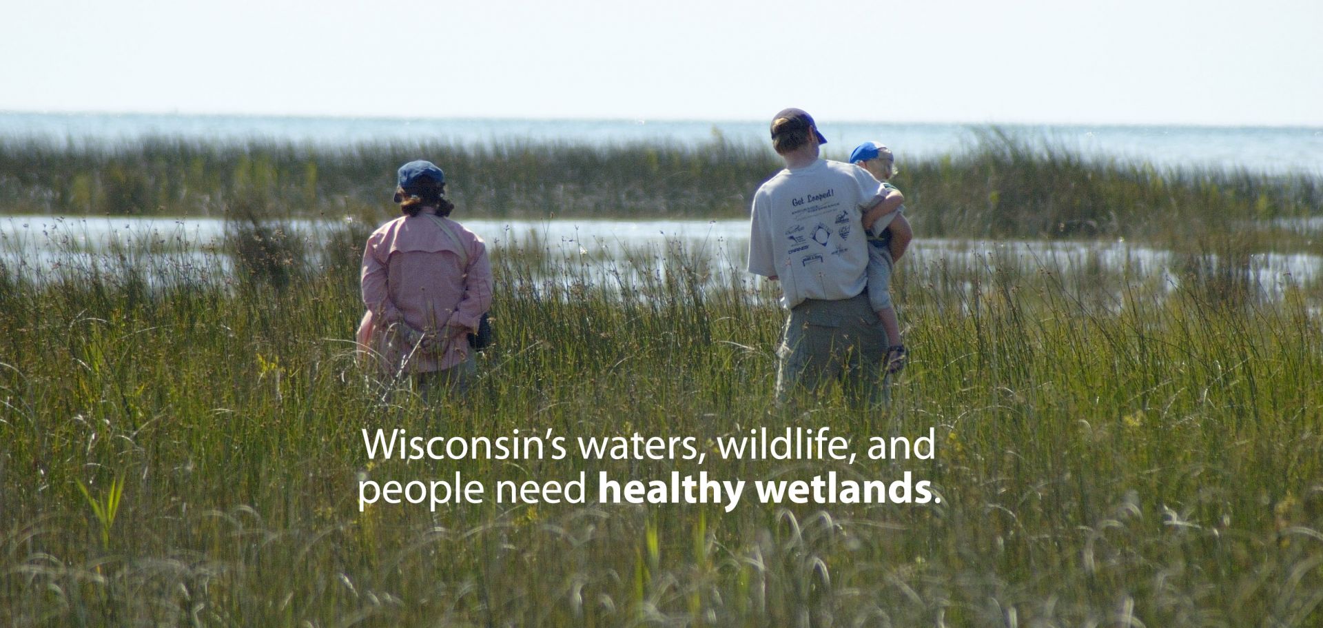 Family in wetland Wisconsin's waters, wildlife, and people need healthy wetlands