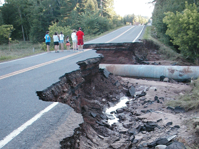 Washed out culvert and road