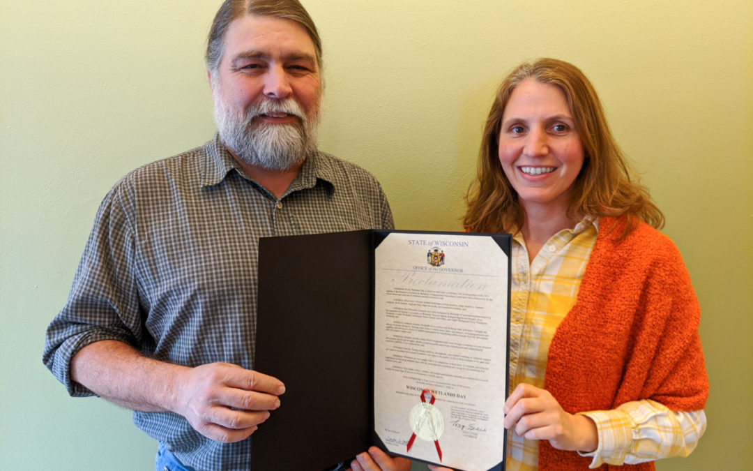 WWA's Tracy Hames and Jennifer Western Hauser hold the official proclamation.