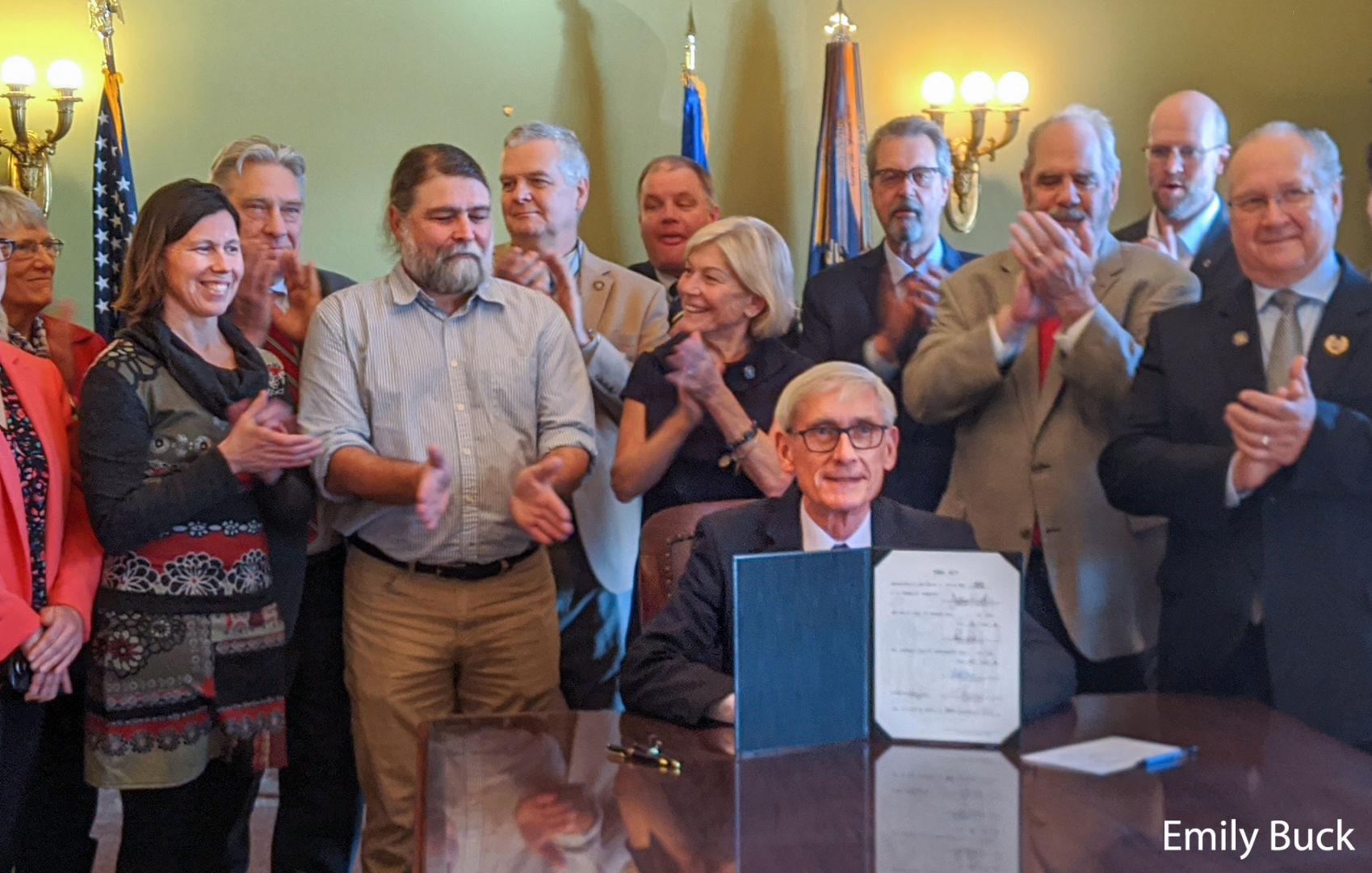 Lawmaker shaking hand with landowner